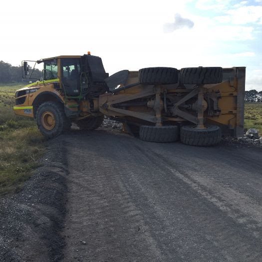 articulated dump truck rolled